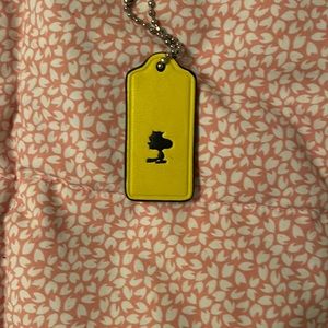 Coach Woodstock bag charm.